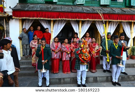 KATHMANDU - OCT 11: People of the Nepalese high society, the Royal ladies, gathered in the Royal Palace to celebrate the first day of the Dashain festival. On October 11, 2013 in Kathmandu, Nepal