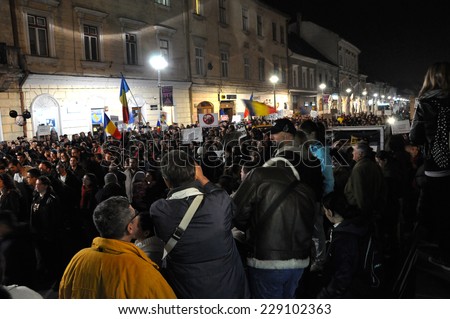 CLUJ, ROMANIA - NOVEMBER 8: Romanians protest against Victor Ponta because Romanians abroad were stopped from voting by the Socialist Government. On Nov 8, 2014 in Cluj, Romania