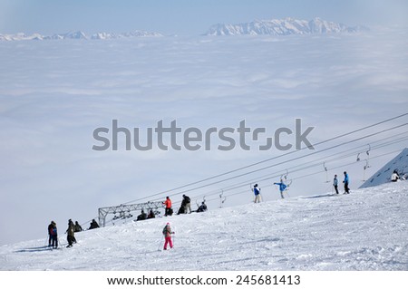 KAPRUN, AUSTRIA - MARCH 6: Unidentified skiers enjoy the last ski week of the season in the Kitzsteinhorn ski resort on March 6, 2012 in Kaprun, Austria