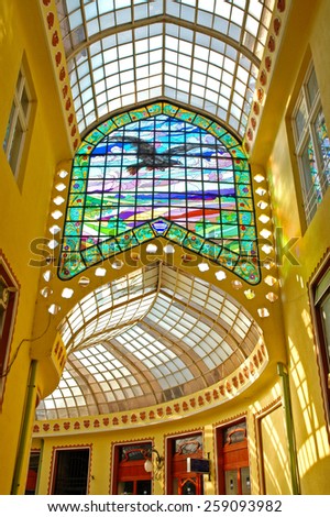 ORADEA - OCTOBER 12: The Black Eagle Palace equipped with a glass covered passage is one the major tourist destination of the city. On October 12, 2005, in Oradea, Romania