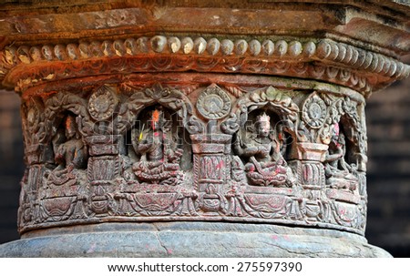 BHAKTAPUR - OCTOBER 10: Carved stone figures on a public Hindu temple. The temple was destroyed after that earthquake hit Nepal on April 25, 2015. On Oct. 10, 2013 in Bhaktapur, Nepal