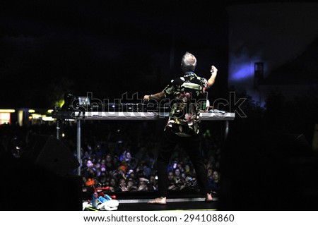 BONTIDA - JUNE 26, 2015: Fatboy Slim aka Norman Cook performs live at the main stage of the Electric Castle Festival at June 26, 2015 in the Banffy castle in Bontida, Romania