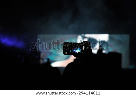 BONTIDA - JUNE 26, 2015: Fatboy Slim performs live at the main stage of the Electric Castle Festival with great visual effects at June 26, 2015 in the Banffy castle in Bontida, Romania