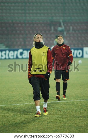 CLUJ, ROMANIA - DECEMBER 7: Soccer player and legend of AS Roma, Philippe Mexes at the official training before UEFA CL game against CFR 1907 Cluj on December 7, 2010 in Cluj-Napoca, Romania