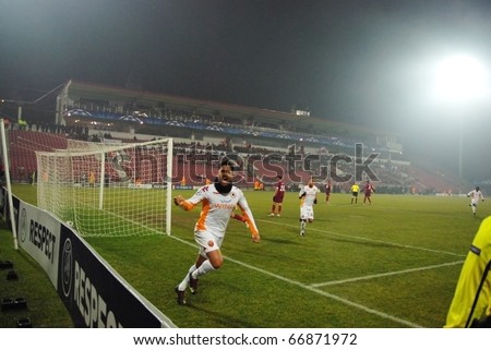 CLUJ NAPOCA, ROMANIA - DECEMBER 8: AS Roma players celebrate a goal at a Champions League soccer game CFR 1907 Cluj vs AS Roma on December 8, 2010 in Cluj Napoca, Romania