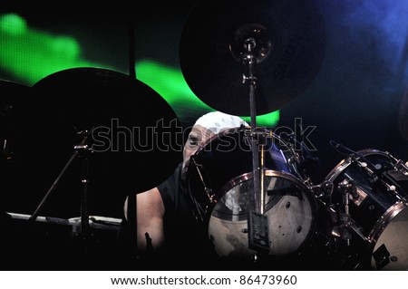 CLUJ NAPOCA, ROMANIA – OCTOBER 9: Drummer Steve Pinnell from The Smokie pop-rock band performs live at Cluj Arena Grand Opening concert on October 9, 2011 in Cluj-Napoca, Romania