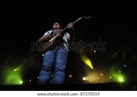 CLUJ NAPOCA, ROMANIA – OCTOBER 9: Mick McConnell from The Smokie pop-rock band performs live on the stage at Cluj Arena Grand Opening concert on October 9, 2011 in Cluj-Napoca, Romania