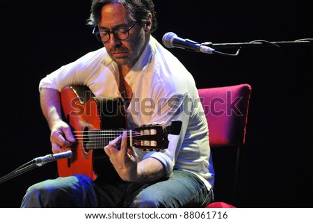 CLUJ NAPOCA, ROMANIA – NOVEMBER 1: Jazz-fusion guitarist legend, Al di Meola and New World Sinfonia performs live at Cluj National Theater of Cluj, Romania, November 1, 2011 in Cluj-Napoca, Romania