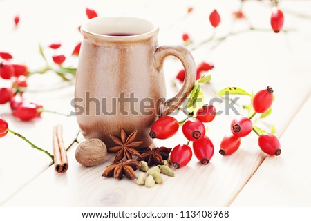 cup of mulled wine with spices - food and drink