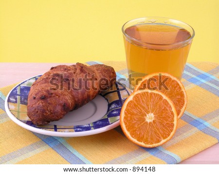 delicious breakfast - bakery\'s goods, juice and oranges