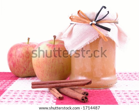 jar of apple jam some fresh apples and cinnamon sticks - ready for apple pie