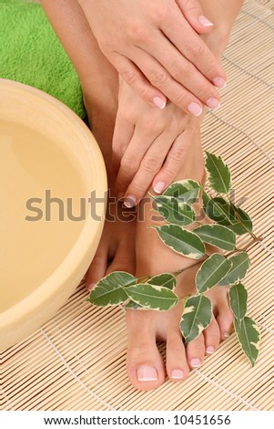beautiful legs and hands - beauty treatment - bowl of pure water