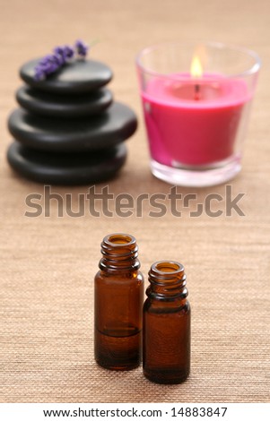 lavender flower black pebbles and lavender oil - spa treatment