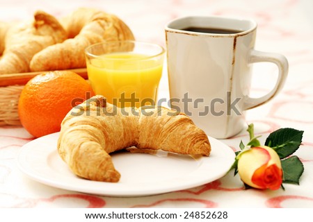 butter croissant and coffee for breakfast - food and drink