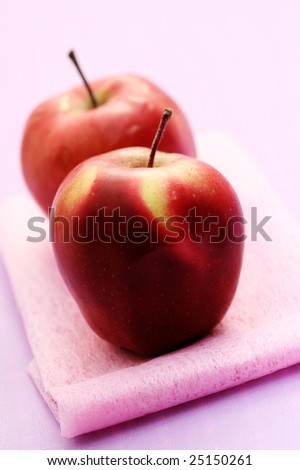 two red apples on pink - food and drink
