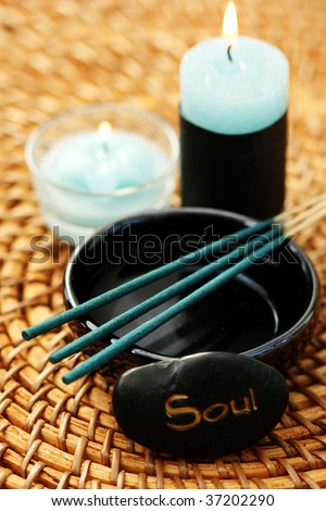 soul pebble and incense sticks - beauty treatment
