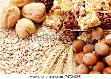 delicious and healthy granola bars with some nuts - diet and breakfast
