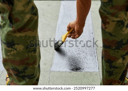 Similar – Image, Stock Photo Crop man painting on studio floor