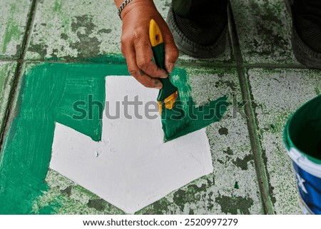 Similar – Image, Stock Photo Crop man painting on studio floor