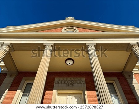 Similar – Image, Stock Photo Brick columns and facade of an university building in the afternoon