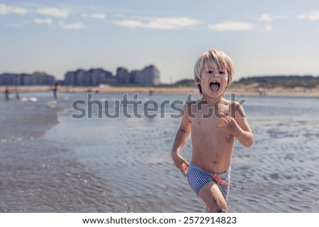 Similar – Image, Stock Photo Cheerful boy running through park
