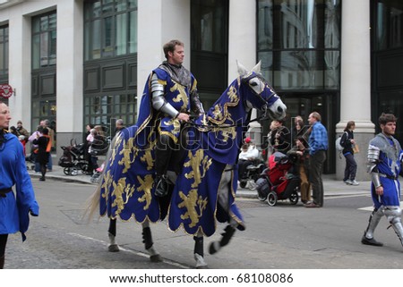 CITY OF LONDON, ENGLAND - NOVEMBER 12: Knight on horseback rides in the Lord Mayor\'s Show parade in the City of London on November 12, 2010. The Lord Mayor\'s Show is an annual parade in London.