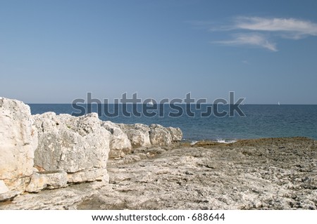 Blue sea coast in the protected natural marine area of Premantura peninsula near Pula (Pola), Istra, Croatia
