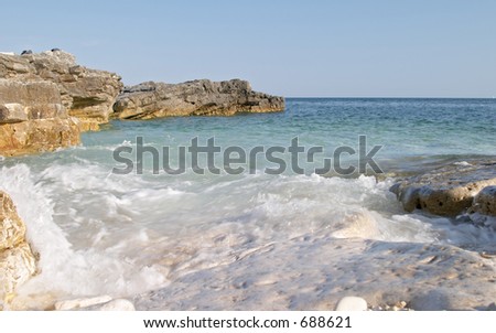 Blue sea coast in the protected natural marine area of Premantura peninsula near Pula (Pola), Istra, Croatia