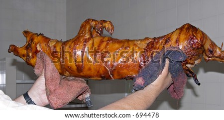 Preparation of roasted pork, a traditional Portuguese recipe, Lisbon, Portugal