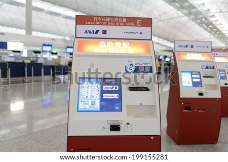 HONG KONG - APRIL 01: check-in kiosks in Airport on April 01, 2014 in Hong Kong, China. Hong Kong International Airport is one of the best airport in the annual passenger survey by Skytrax.