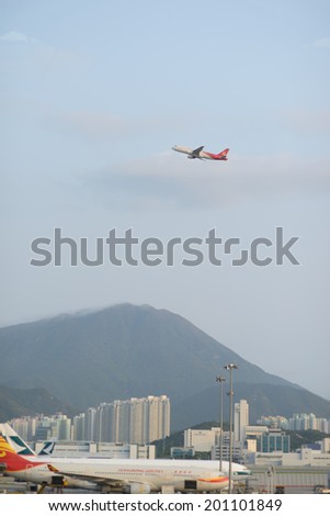 HONG KONG - APRIL 17: Shenzhen Airlines jet flight take-off on April 17, 2014 in Hong Kong. Hong Kong International Airport is the one of the best airport in the annual passenger survey by Skytrax.
