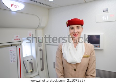 DUBAI - MAY 16: Emirates crew member in Airbus A380 aircraft on May 16, 2014 in Dubai, UAE. Emirates handles major part of passenger traffic and aircraft movements at the airport.