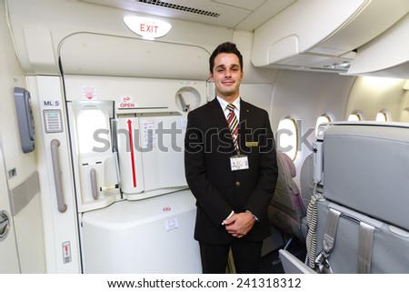 DUBAI - OCT 17: Emirates crew member in Airbus A380 aircraft on October 17, 2014 in Dubai, UAE. Emirates handles major part of passenger traffic and aircraft movements at the airport.