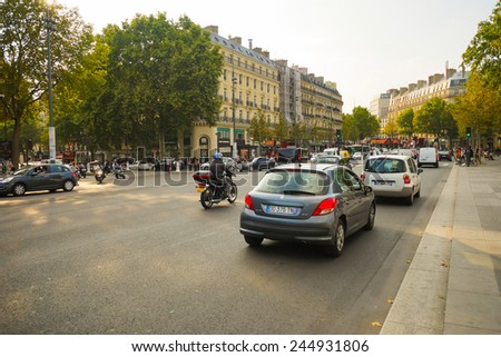 PARIS - SEP 06: cars on street on September 06, 2014 in Paris, France. Paris, aka City of Love, is a popular travel destination and a major city in Europe