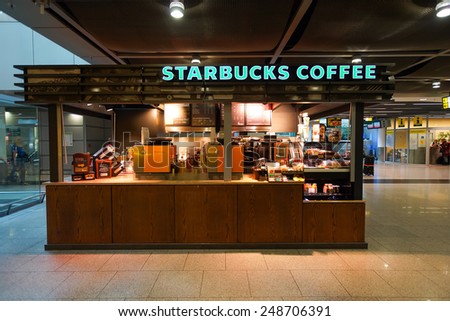 DUSSELDORF - SEPTEMBER 16: airport Starbucks cafe on September 16, 2014 in Dusseldorf, Germany. Starbucks is the largest coffeehouse company in the world, with more then 23000 stores