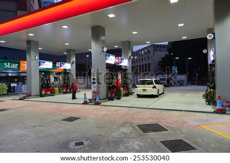 HONG KONG - FEBRUARY 04, 2015: Caltex fuel station at evening. Caltex is a petroleum brand name of Chevron Corporation used in more than 60 countries