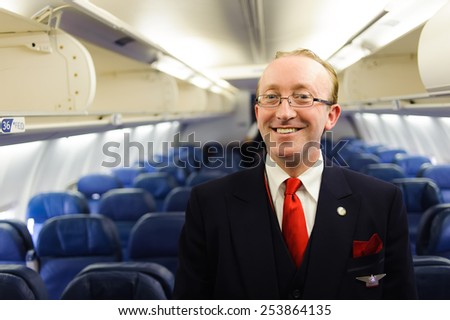 NEW-YORK, USA - APRIL 19, 2011: Delta Air Lines crew member in Boeing 757. Delta Air Lines, Inc. is a major American airline, with its headquarters and largest hub in Atlanta, Georgia