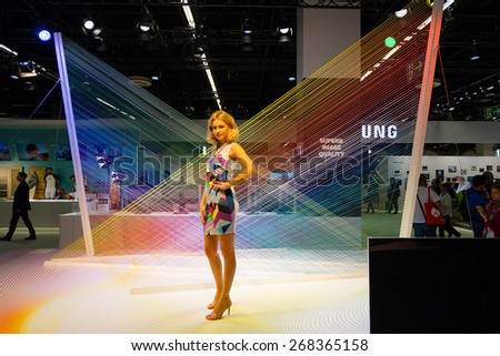 COLOGNE, GERMANY - SEPTEMBER 19, 2014: Samsung stand in the Photokina Exhibition. The Photokina is the world\'s largest trade fair for the photographic and imaging industries