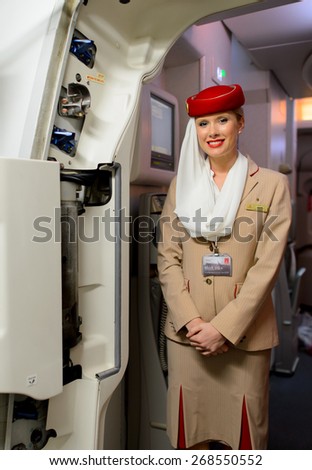 HONGKONG, CHINA - DECEMBER 10, 2014: Emirates Airbus A380 crew member. Emirates handles major part of passenger traffic and aircraft movements at the airport.
