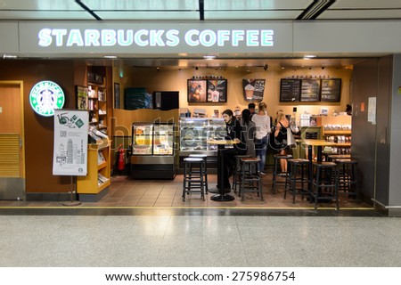 HONG KONG - MAY 05, 2015: Starbucks cafe interior. Starbucks is the largest coffeehouse company in the world, with more then 23000 stores