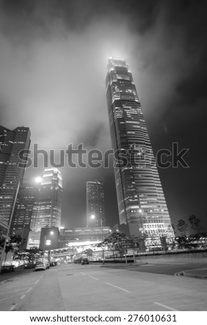 HONG KONG - APRIL 21: Hong Kong downtown skyscrapers at night on April 21, 2014 in Hong Kong, China. Hong Kong alternatively known by its initials H.K., is situated on China\'s south coast.