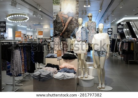SHENZHEN, CHINA - MAY 25, 2015: shopping center interior. Shenzhen is a major city of Southern China\'s Guangdong Province, situated immediately north of Hong Kong Special Administrative Region.