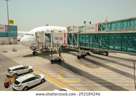 DUBAI, UAE - JUNE 22, 2015: Emirates A380-800 docked in Airport. Emirates is one of two flag carriers of the United Arab Emirates along with Etihad Airways and is based in Dubai.