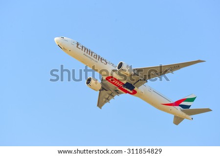 HONG KONG - APRIL 15, 2015: Emirates Boeing 777 take off. Emirates is one of two flag carriers of the United Arab Emirates along with Etihad Airways and is based in Dubai.