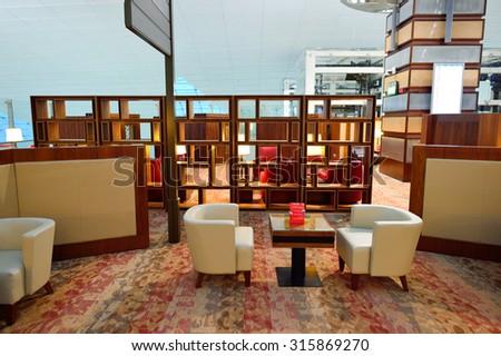 DUBAI - JUNE 22, 2015: Emirates business class lounge interior. Emirates is the largest airline in the Middle East. It is an airline based in Dubai, United Arab Emirates.