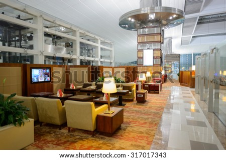 DUBAI - SEPTEMBER 08, 2015: Emirates business class lounge interior. Emirates is the largest airline in the Middle East. It is an airline based in Dubai, United Arab Emirates.