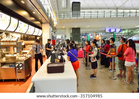 HONG KONG - JUNE 04, 2015: McDonald\'s restaurant interior. McDonald\'s is the world\'s largest chain of hamburger fast food restaurants, founded in the United States.