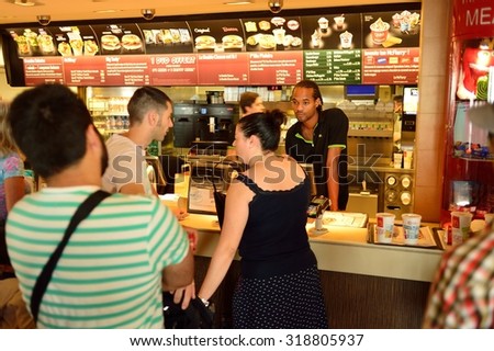 NICE, FRANCE - AUGUST 15, 2015: McDonald\'s restaurant interior. McDonald\'s is the world\'s largest chain of hamburger fast food restaurants, founded in the United States.