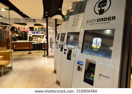 PARIS - AUGUST 08, 2015: McDonald\'s restaurant interior. McDonald\'s is the world\'s largest chain of hamburger fast food restaurants, founded in the United States.