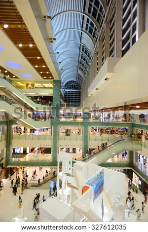 HONG KONG - MAY 17, 2015: New Town Plaza interior. New Town Plaza is a shopping mall in the town centre of Sha Tin in Hong Kong. Developed by Sun Hung Kai Properties.